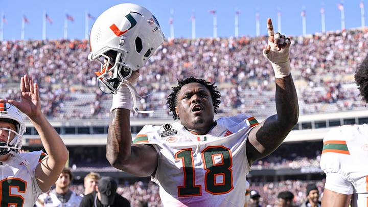 Dec 20, 2025; College Station, TX, USA; Miami Hurricanes defensive lineman Armondo Blount (18) holds up his helmet as he celebrates the Hurricanes win over the Texas A&M Aggies at Kyle Field. Mandatory Credit: Jerome Miron-Imagn Images