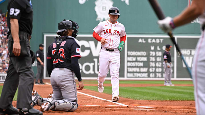 Sep 1, 2025; Boston, Massachusetts, USA; Boston Red Sox third baseman Alex Bregman (2) scores on an RBI by second baseman Romy Gonzalez (23) (not pictured)  during the first inning against the Cleveland Guardians at Fenway Park. Mandatory Credit: Eric Canha-Imagn Images
