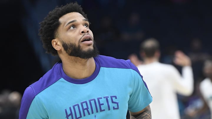Apr 8, 2025; Charlotte, North Carolina, USA;  Charlotte Hornets forward Miles Bridges (0) warms up before the game against the Memphis Grizzlies at the Spectrum Center. Mandatory Credit: Sam Sharpe-Imagn Images