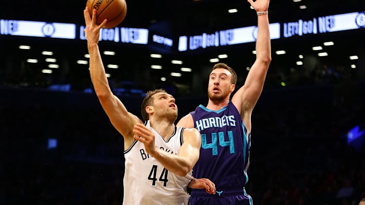 Dec 26, 2016; Brooklyn, NY, USA; Brooklyn Nets guard Bojan Bogdanovic (44) shoots the ball as Charlotte Hornets forward Frank Kaminsky (44) defends during the second half at Barclays Center. The Nets won 120-118. Mandatory Credit: Andy Marlin-Imagn Images