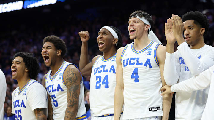 Mar 20, 2026; Philadelphia, PA, USA; UCLA Bruins guard Skyy Clark (55), guard Brandon Williams (5), center Steven Jamerson II (24), and  guard Jamar Brown (4) react on the bench in the second half during a first round game of the men's 2026 NCAA Tournament at Xfinity Mobile Arena. Mandatory Credit: Bill Streicher-Imagn Images