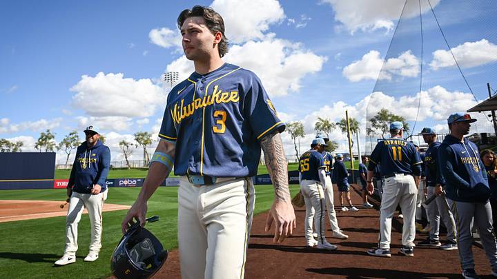 Milwaukee Brewers infield prospect Andrew Fischer walks across the field during spring training workouts Tuesday, February 17, 2026, at American Family Fields of Phoenix in Phoenix, Arizona. Milwaukee Brewers infield prospect Andrew Fischer walks across the field during spring training workouts Tuesday, February 17, 2026, at American Family Fields of Phoenix in Phoenix, Arizona.