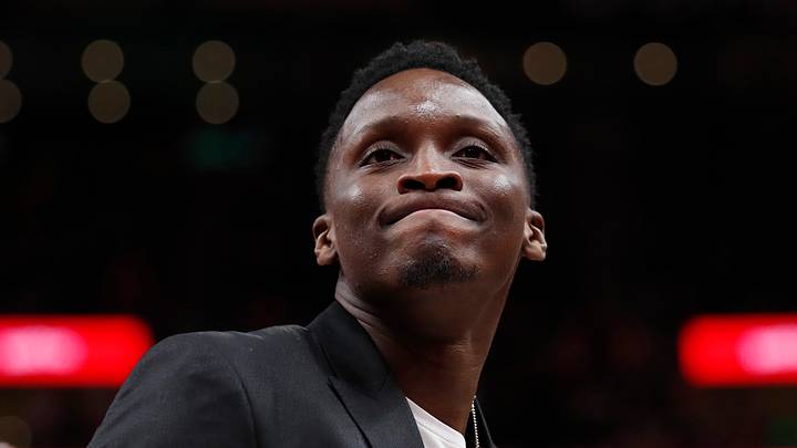 Nov 26, 2018; Salt Lake City, UT, USA; Indiana Pacers guard Victor Oladipo (4) reacts towards Utah Jazz fans as he sits the bench with an injury against the Utah Jazz at Vivint Smart Home Arena. Mandatory Credit: Jeff Swinger-USA TODAY Sports