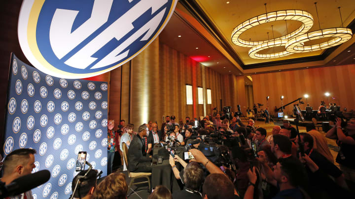 Jalen Milroe takes questions at SEC Media Days.