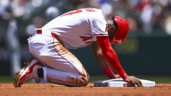 May 25, 2025; Anaheim, California, USA; Los Angeles Angels shortstop Tim Anderson (77) forced out at second base against the Miami Marlins during the first inning at Angel Stadium. Mandatory Credit: Jonathan Hui-Imagn Images May 25, 2025; Anaheim, California, USA; Los Angeles Angels shortstop Tim Anderson (77) forced out at second base against the Miami Marlins during the first inning at Angel Stadium. Mandatory Credit: Jonathan Hui-Imagn Images