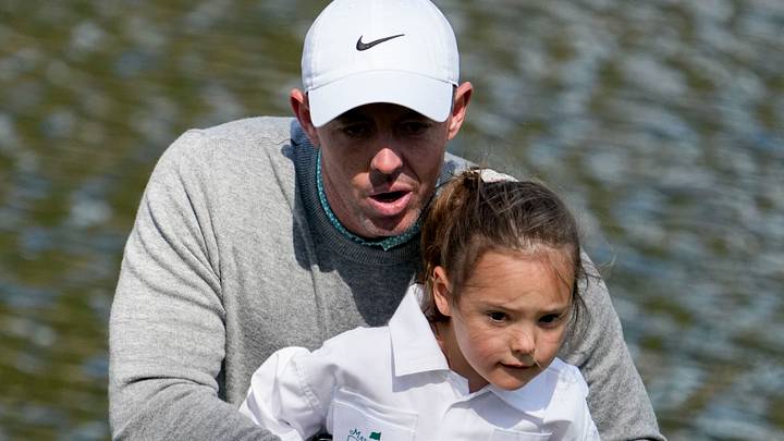 Apr 8, 2026; Augusta, Georgia, USA; Rory McIlroy and his daughter, Poppy, look over the ninth green during the Par 3 Contest at the Masters Tournament at Augusta National Golf Club. Apr 8, 2026; Augusta, Georgia, USA; Rory McIlroy and his daughter, Poppy, look over the ninth green during the Par 3 Contest at the Masters Tournament at Augusta National Golf Club.