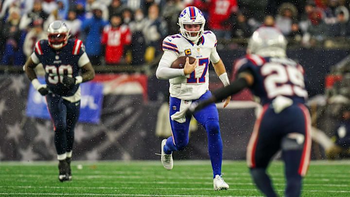 Dec 14, 2025; Foxborough, Massachusetts, USA; Buffalo Bills quarterback Josh Allen (17) runs the ball against the New England Patriots in the second half at Gillette Stadium.