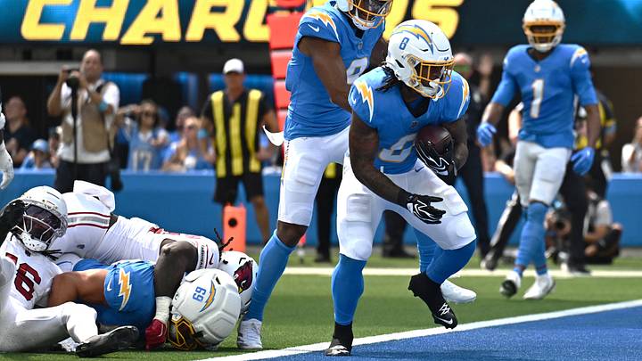 Sep 13, 2026; Inglewood, California, USA;  Los Angeles Chargers running back Omarion Hampton (8) carries the ball for a touchdown against the Arizona Cardinals during the first quarter at SoFi Stadium.  Mandatory Credit: William Liang-Imagn Images