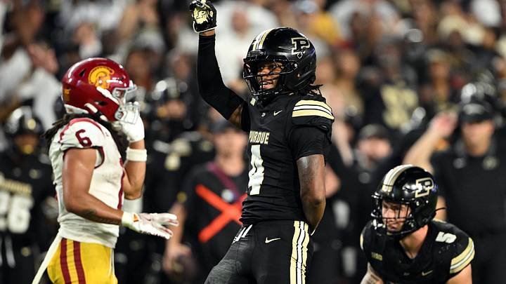 Purdue Boilermakers defensive back Hudauri Hines (4) celebrates an incomplete pass.