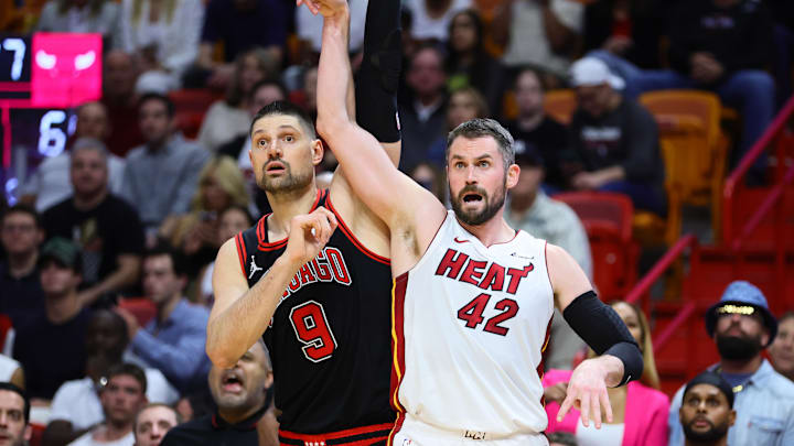 Apr 19, 2024; Miami, Florida, USA; Miami Heat forward Kevin Love (42) watches his shot 