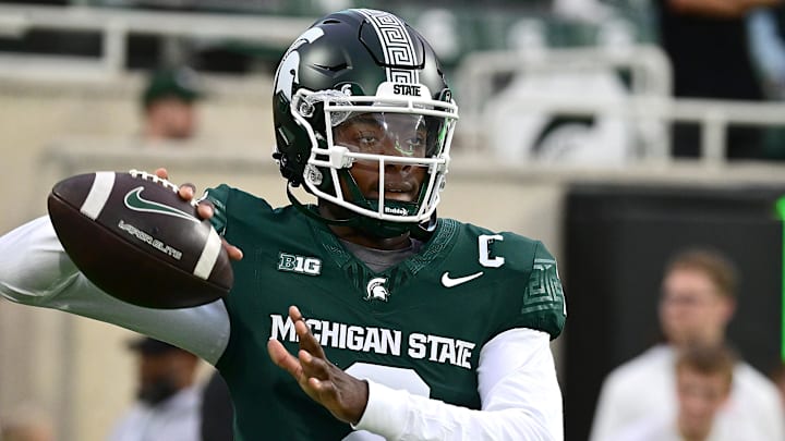 Sep 28, 2024; East Lansing, Michigan, USA;  Michigan State Spartans quarterback Aidan Chiles (2) warms up before the game against the Ohio State Buckeyes at Spartan Stadium. Mandatory Credit: Dale Young-Imagn Images