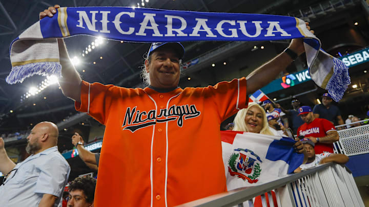 Mar 13, 2023; Miami, Florida, USA; A baseball fan of Nicaragua enjoys the game against Dominican Republic during the first round of the World Baseball Classic at LoanDepot Park.