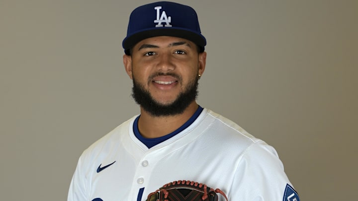 Feb 18, 2025; Glendale, AZ, USA; Los Angeles Dodgers pitcher Carlos Duran (83) poses for a photo during media day at Camelback Ranch. Mandatory Credit: Jayne Kamin-Oncea-Imagn Images