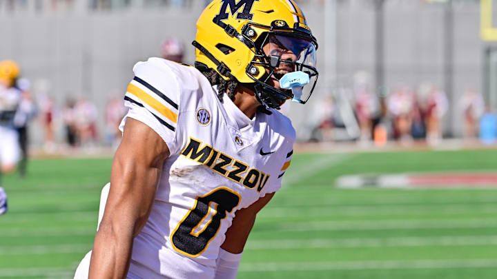 Oct 12, 2024; Amherst, Massachusetts, USA; Missouri Tigers wide receiver Joshua Manning (0)  reacts to his touchdown against the Massachusetts Minutemen during the second half at Warren McGuirk Alumni Stadium. Mandatory Credit: Eric Canha-Imagn Images
