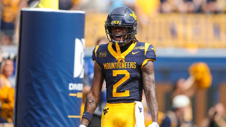 Sep 12, 2026; Morgantown, West Virginia, USA; West Virginia Mountaineers wide receiver DJ Epps (2) celebrates after catching a pass for a touchdown during the first quarter against the UT Martin Skyhawks at Milan Puskar Stadium. Mandatory Credit: Ben Queen-Imagn Images Sep 12, 2026; Morgantown, West Virginia, USA; West Virginia Mountaineers wide receiver DJ Epps (2) celebrates after catching a pass for a touchdown during the first quarter against the UT Martin Skyhawks at Milan Puskar Stadium. Mandatory Credit: Ben Queen-Imagn Images