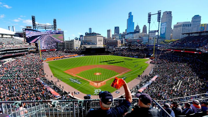 A Detroit Tigers fan waves his orange towel before the start of Game 4 between the Seattle Mariners and the Detroit Tigers in the ALDS at Comerica Park in Detroit on Wednesday, Oct. 8, 2025.