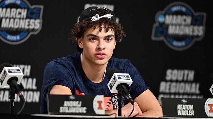 Mar 28, 2026; Houston, TX, USA; Illinois Fighting Illini guard Keaton Wagler (23) speaks in a press conference after defeating the Iowa Hawkeyes in an Elite Eight game of the South Regional of the men's 2026 NCAA Tournament at Toyota Center. Mandatory Credit: Maria Lysaker-Imagn Images