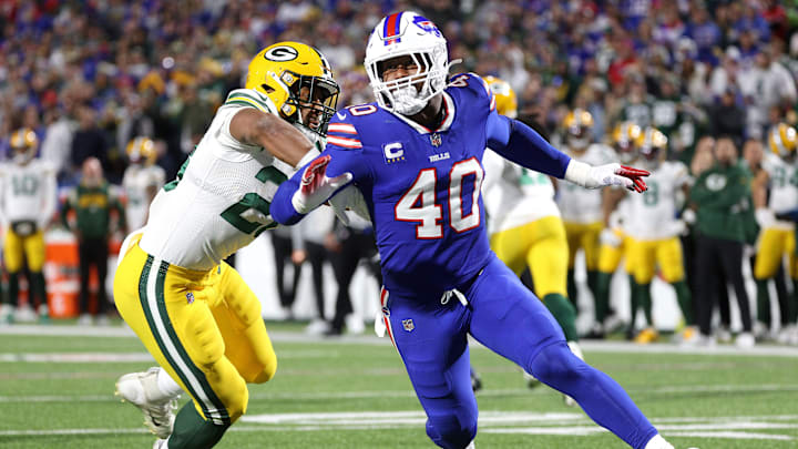 The Bills' Von Miller rushes around the end against the Packers. The Bills' Von Miller rushes around the end against the Packers.