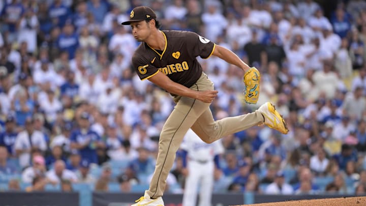 Oct 11, 2024; Los Angeles, California, USA; San Diego Padres pitcher Yu Darvish (11) pitches in the first inning against the Los Angeles Dodgers during game five of the NLDS for the 2024 MLB Playoffs at Dodger Stadium. Mandatory Credit: Jayne Kamin-Oncea-Imagn Images Oct 11, 2024; Los Angeles, California, USA; San Diego Padres pitcher Yu Darvish (11) pitches in the first inning against the Los Angeles Dodgers during game five of the NLDS for the 2024 MLB Playoffs at Dodger Stadium. Mandatory Credit: Jayne Kamin-Oncea-Imagn Images