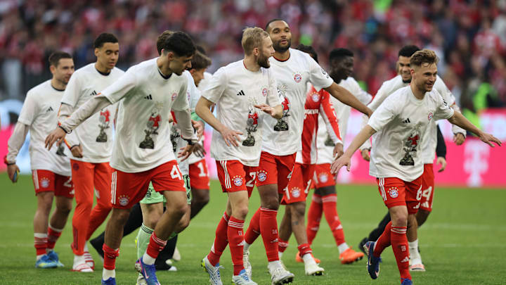 Bayern Munich players celebrating with fans after sealing the Bundesliga title with a win against VfB Stuttgart on Sunday.