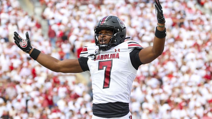 Oct 19, 2024; Norman, Oklahoma, USA;  South Carolina Gamecocks defensive back Nick Emmanwori (7) reacts after returning an interception for a touchdown during the first half against the Oklahoma Sooners at Gaylord Family-Oklahoma Memorial Stadium. Mandatory Credit: Kevin Jairaj-Imagn Images