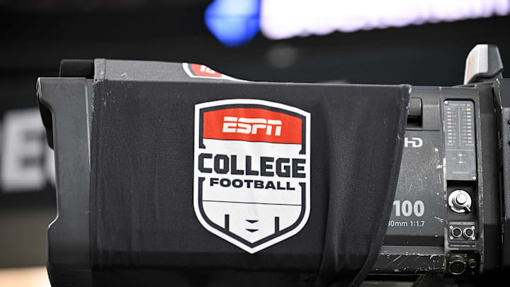 Dec 6, 2025; Arlington, TX, USA; A view of a tv camera and the ESPN college football logo before the game between the Texas Tech Red Raiders and the BYU Cougars at AT&T Stadium. Mandatory Credit: Jerome Miron-Imagn Images