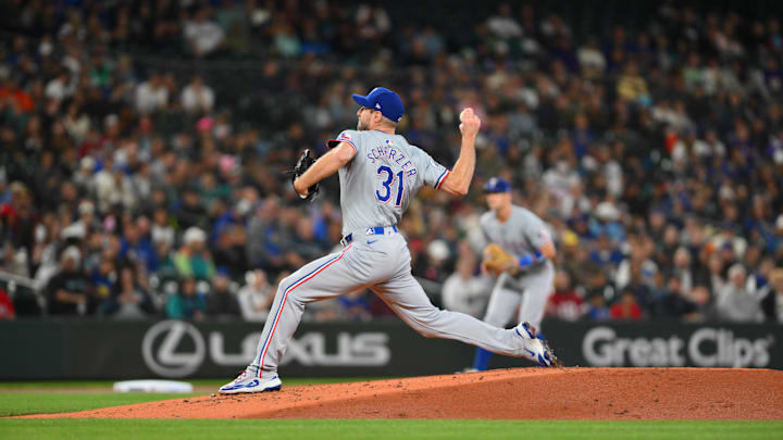 Sep 14, 2024; Seattle, Washington, USA; Texas Rangers starting pitcher Max Scherzer (31) pitches to the Seattle Mariners during the first inning at T-Mobile Park. Mandatory Credit: Steven Bisig-Imagn Images