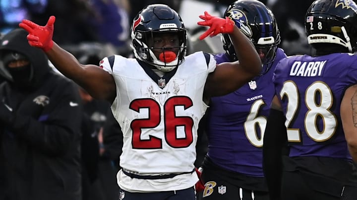 Jan 20, 2024; Baltimore, MD, USA; Houston Texans running back Devin Singletary (26) reacts after