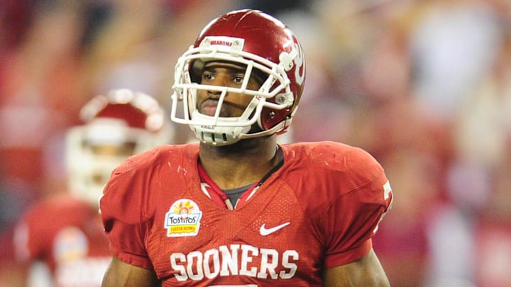 Jan. 1, 2011; Glendale, AZ, USA; Oklahoma Sooners running back (7) DeMarco Murray against the Connecticut Huskies in the 2011 Fiesta Bowl at University of Phoenix Stadium. The Sooners defeated the Huskies 48-20. Mandatory Credit: Mark J. Rebilas-Imagn Images