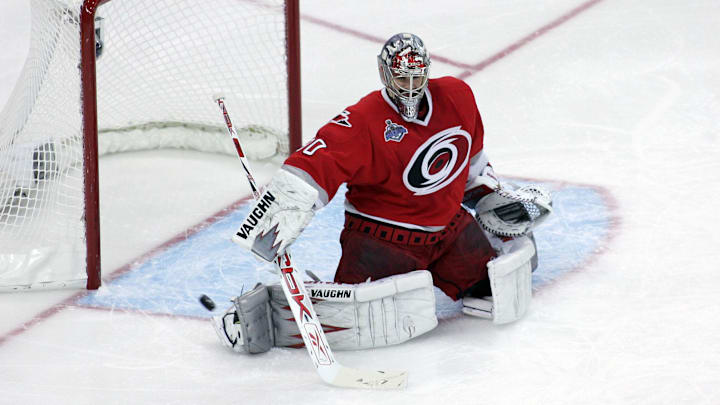 Cam Ward drops down to make a save during the 2006 Stanley Cup finals against the Oilers.
