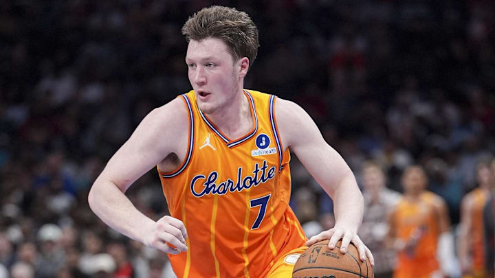 Feb 19, 2026; Charlotte, North Carolina, USA;  Charlotte Hornets guard Kon Knueppel (7) moves the ball against the Houston Rockets during the second  quarter at Spectrum Center. Mandatory Credit: Jim Dedmon-Imagn Images