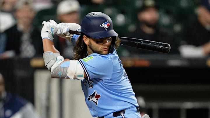 May 28, 2024; Chicago, Illinois, USA;  Toronto Blue Jays infielder Bo Bichette (11) bats against the Chicago White Sox at Guaranteed Rate Field. Mandatory Credit: Jamie Sabau-USA TODAY Sports