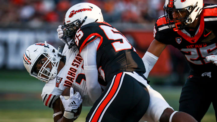 Dexter Foster (55) has amassed 95 career tackles and 5 tackles for loss in 19 career games for the Beavers. 