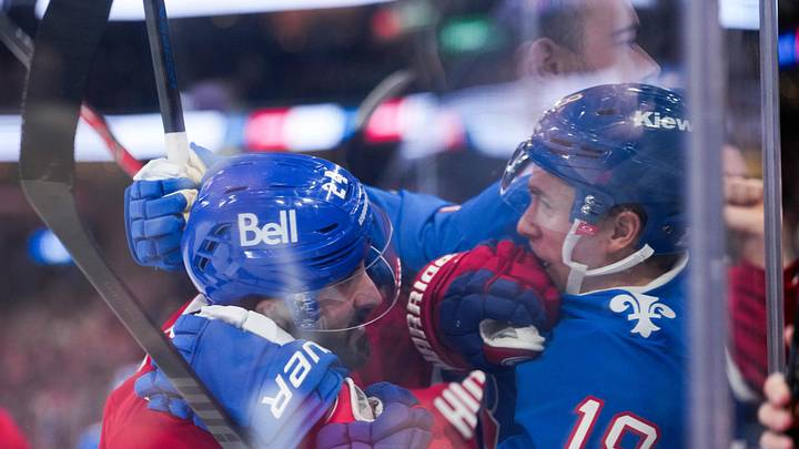 Jan 29, 2026; Montreal, Quebec, CAN; Montreal Canadiens forward Philip Danault (24) and Colorado Avalanche forward Jack Drury (18) fight during the second period at the Bell Centre. Mandatory Credit: Eric Bolte-Imagn Images