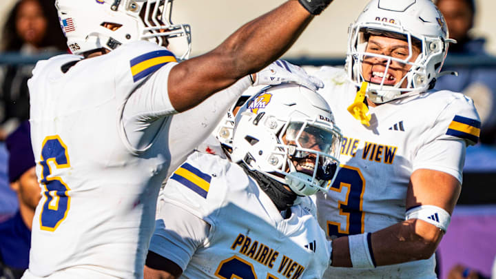 Prairie View A&M lineback Darrell Starling Jr. (25) celebrates with defensive lineman Malik Gucake (6) and linebacker Sterling Roberts (3) after catching an interception during the SWAC football championship game between Jackson State and Prairie View A&M at Mississippi Veterans Memorial Stadium in Jackson, Miss., on Saturday, Dec. 6, 2025. Prairie View A&M lineback Darrell Starling Jr. (25) celebrates with defensive lineman Malik Gucake (6) and linebacker Sterling Roberts (3) after catching an interception during the SWAC football championship game between Jackson State and Prairie View A&M at Mississippi Veterans Memorial Stadium in Jackson, Miss., on Saturday, Dec. 6, 2025.