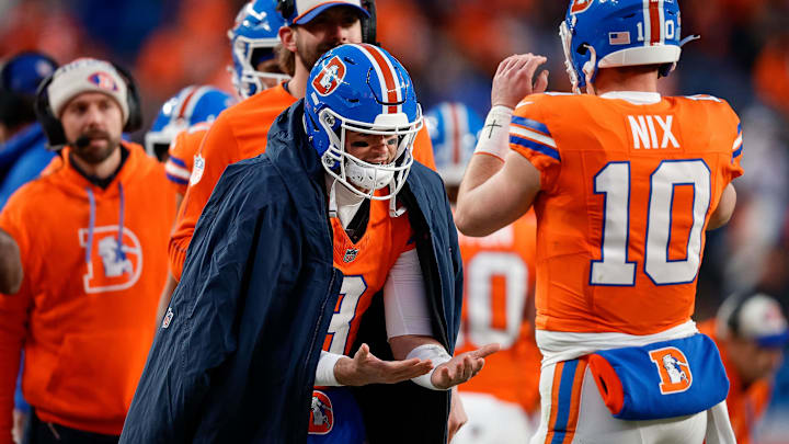 Jan 5, 2025; Denver, Colorado, USA; Denver Broncos quarterback Jarrett Stidham (8) celebrates with quarterback Bo Nix (10) after a play in the fourth quarter against the Kansas City Chiefs at Empower Field at Mile High. Mandatory Credit: Isaiah J. Downing-Imagn Images Jan 5, 2025; Denver, Colorado, USA; Denver Broncos quarterback Jarrett Stidham (8) celebrates with quarterback Bo Nix (10) after a play in the fourth quarter against the Kansas City Chiefs at Empower Field at Mile High. Mandatory Credit: Isaiah J. Downing-Imagn Images