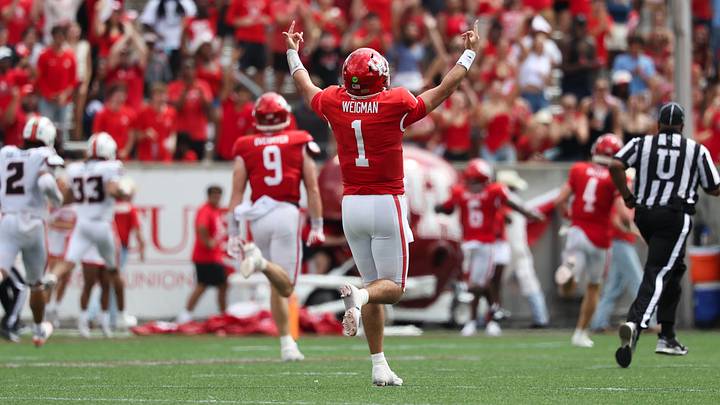 Sep 5, 2026; Houston, Texas, USA; Houston Cougars quarterback Conner Weigman (1) reacts as running back Re'shaun Sanford II (6) runs for a touchdown during the second quarter against the Oregon State Beavers at TDECU Stadium. Mandatory Credit: Troy Taormina-Imagn Images Sep 5, 2026; Houston, Texas, USA; Houston Cougars quarterback Conner Weigman (1) reacts as running back Re'shaun Sanford II (6) runs for a touchdown during the second quarter against the Oregon State Beavers at TDECU Stadium. Mandatory Credit: Troy Taormina-Imagn Images