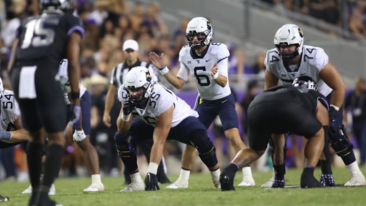 Sep 30, 2023; Fort Worth, Texas, USA; West Virginia Mountaineers offensive lineman Tomas Rimac (55) on the line of scrimmage in the second quarter against the TCU Horned Frogs at Amon G. Carter Stadium. Mandatory Credit: Tim Heitman-Imagn Images