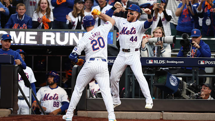 Oct 8, 2024; New York City, New York, USA; New York Mets first baseman Pete Alonso (20) celebrates with outfielder Harrison Bader (44) after hitting a solo home run in the second inning against the Philadelphia Phillies during game three of the NLDS for the 2024 MLB Playoffs at Citi Field. Mandatory Credit: Vincent Carchietta-Imagn Images