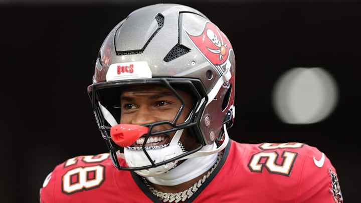 Aug 9, 2025; Tampa, Florida, USA; Tampa Bay Buccaneers safety Shilo Sanders (28) takes the field for warmups before a preseason game against the Tennessee Titans at Raymond James Stadium. Mandatory Credit: Nathan Ray Seebeck-Imagn Images