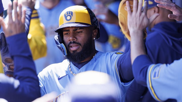 Apr 4, 2026; Kansas City, Missouri, USA; Milwaukee Brewers third baseman Luis Rengifo (13) celebrates in the dugout after scoring during the first inning against the Kansas City Royals at Kauffman Stadium. Mandatory Credit: William Purnell-Imagn Images Apr 4, 2026; Kansas City, Missouri, USA; Milwaukee Brewers third baseman Luis Rengifo (13) celebrates in the dugout after scoring during the first inning against the Kansas City Royals at Kauffman Stadium. Mandatory Credit: William Purnell-Imagn Images