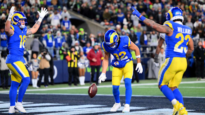 Dec 18, 2025; Seattle, Washington, USA; Los Angeles Rams wide receiver Puka Nacua (12) celebrates after scoring a touchdown against the Seattle Seahawks in the second half at Lumen Field. Mandatory Credit: Steven Bisig-Imagn Images