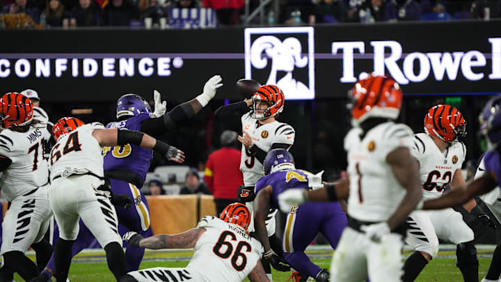 Bengals Joe Burrow (9) looks for a pass during their game against the Ravens at M&T Bank Stadium on Thanksgiving Thursday November 27, 2025. Bengals Joe Burrow (9) looks for a pass during their game against the Ravens at M&T Bank Stadium on Thanksgiving Thursday November 27, 2025.