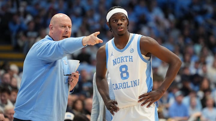 Dec 7, 2025; Chapel Hill, North Carolina, USA; North Carolina Tar Heels assistant coach Pat Sullivan with forward Caleb Wilson (8) in the second half at Dean E. Smith Center. Mandatory Credit: Bob Donnan-Imagn Images Dec 7, 2025; Chapel Hill, North Carolina, USA; North Carolina Tar Heels assistant coach Pat Sullivan with forward Caleb Wilson (8) in the second half at Dean E. Smith Center. Mandatory Credit: Bob Donnan-Imagn Images