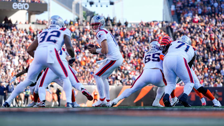 New England Patriots quarterback Drake Maye (10) drops back with the ball in the second quarter of the NFL Week 12 game between the Cincinnati Bengals and the New England Patriots at Paycor Stadium in downtown Cincinnati on Sunday, Nov. 23, 2025.
