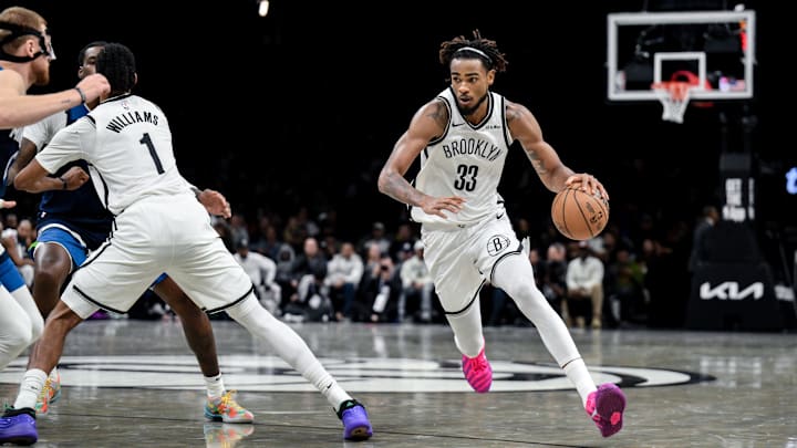 Nov 3, 2025; Brooklyn, New York, USA; Brooklyn Nets center Nic Claxton (33) drives to the basket against the Minnesota Timberwolves during the second half at Barclays Center. Mandatory Credit: John Jones-Imagn Images