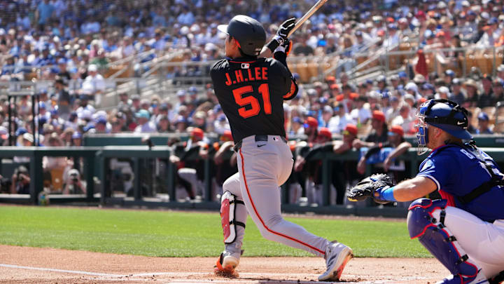 Mar 1, 2025; Phoenix, Arizona, USA; San Francisco Giants outfielder Jung Hoo Lee (51) hits against the Los Angeles Dodgers during the first inning at Camelback Ranch-Glendale. Mar 1, 2025; Phoenix, Arizona, USA; San Francisco Giants outfielder Jung Hoo Lee (51) hits against the Los Angeles Dodgers during the first inning at Camelback Ranch-Glendale.