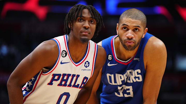 Jan 17, 2023; Los Angeles, California, USA; Philadelphia 76ers guard Tyrese Maxey (0) and LA Clippers forward Nicolas Batum (33) react in the second half at Crypto.com Arena. Mandatory Credit: Kirby Lee-Imagn Images