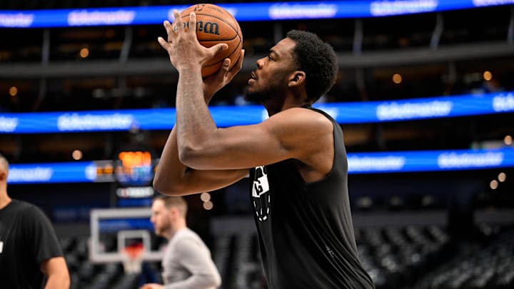 Jan 12, 2026; Dallas, Texas, USA; Brooklyn Nets center Day'ron Sharpe (20) warms up before the game against the Dallas Mavericks at the American Airlines Center. Mandatory Credit: Jerome Miron-Imagn Images