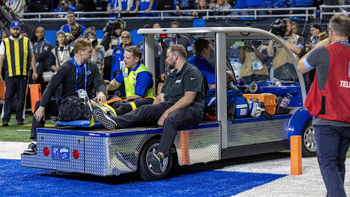 Detroit Lions cornerback Khalil Dorsey is carted off the field after injuring his right leg.